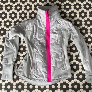 Gray and hot pink north face jacket